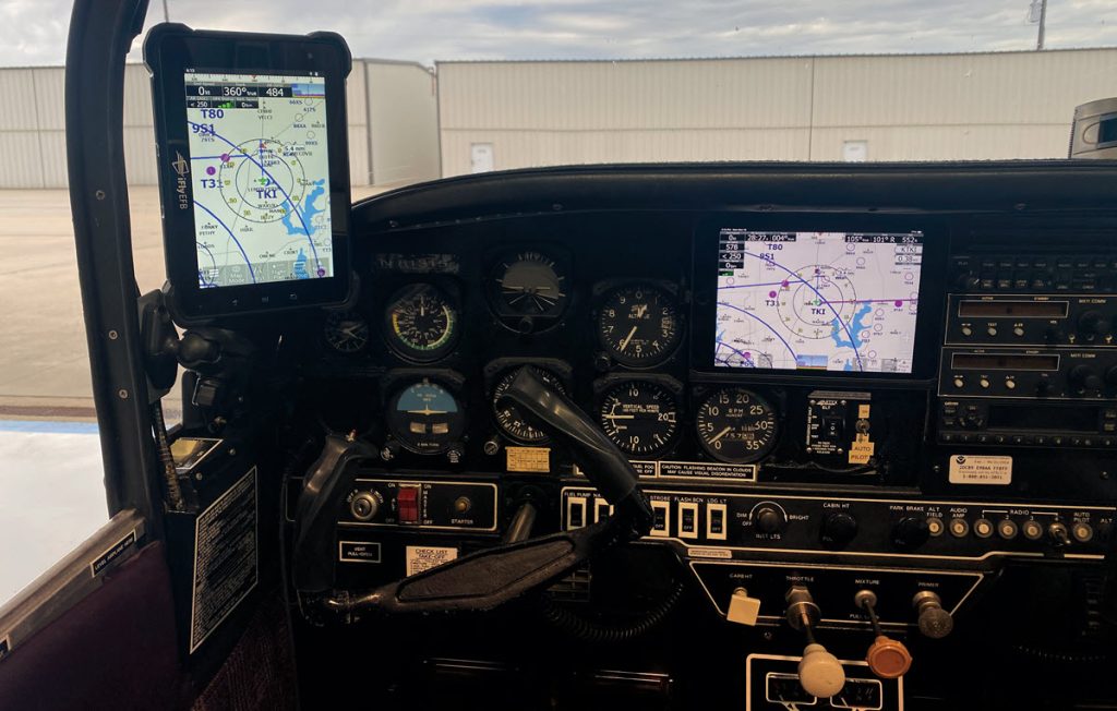 electronic flight bag screen mounted on panel