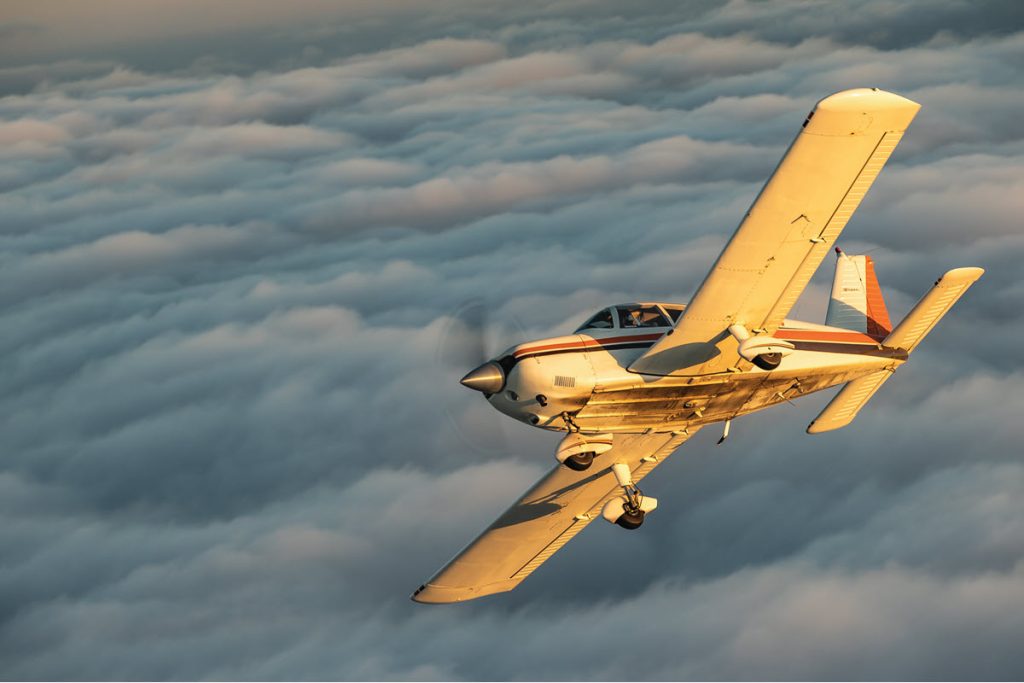 belly of piper cherokee 235 in flight