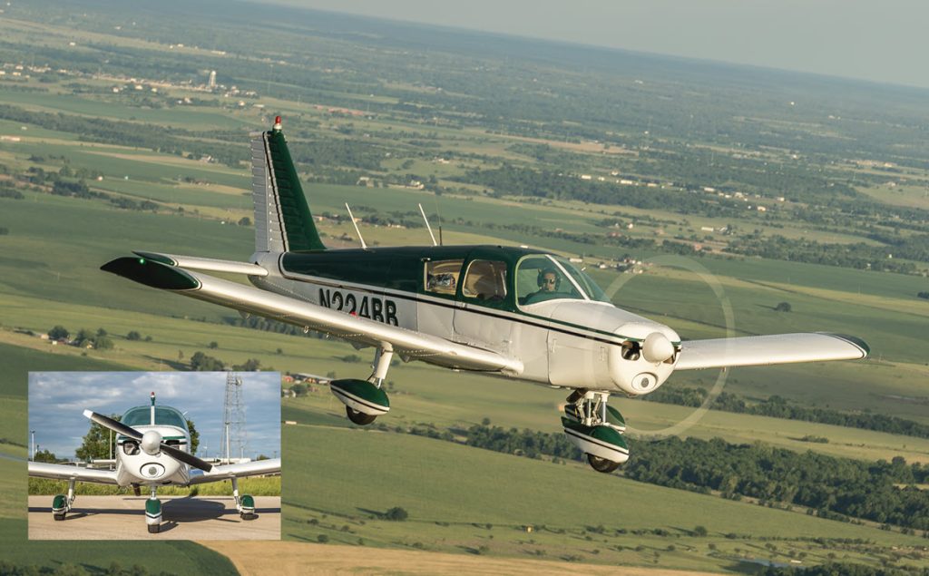 Piper Cherokee 140 in flight with inset on ground photo